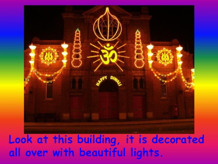 Look at this building, it is decorated  all over with beautiful lights.