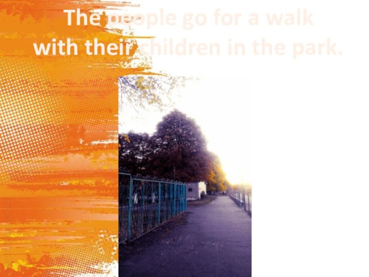The people go for a walk  with their children in the park.