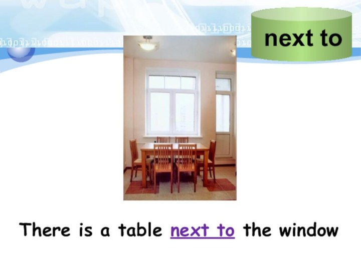 There is a table next to the window