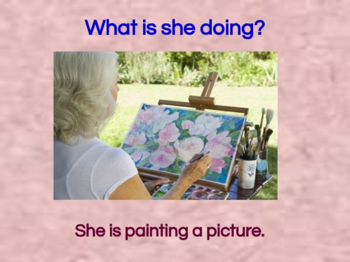 What is she doing?She is painting a picture.